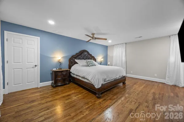 a bedroom with a bed and closet