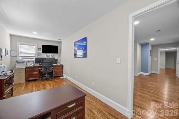 a room with furniture and a flat screen tv