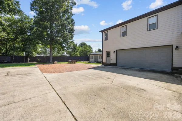 a view of a house with a garage