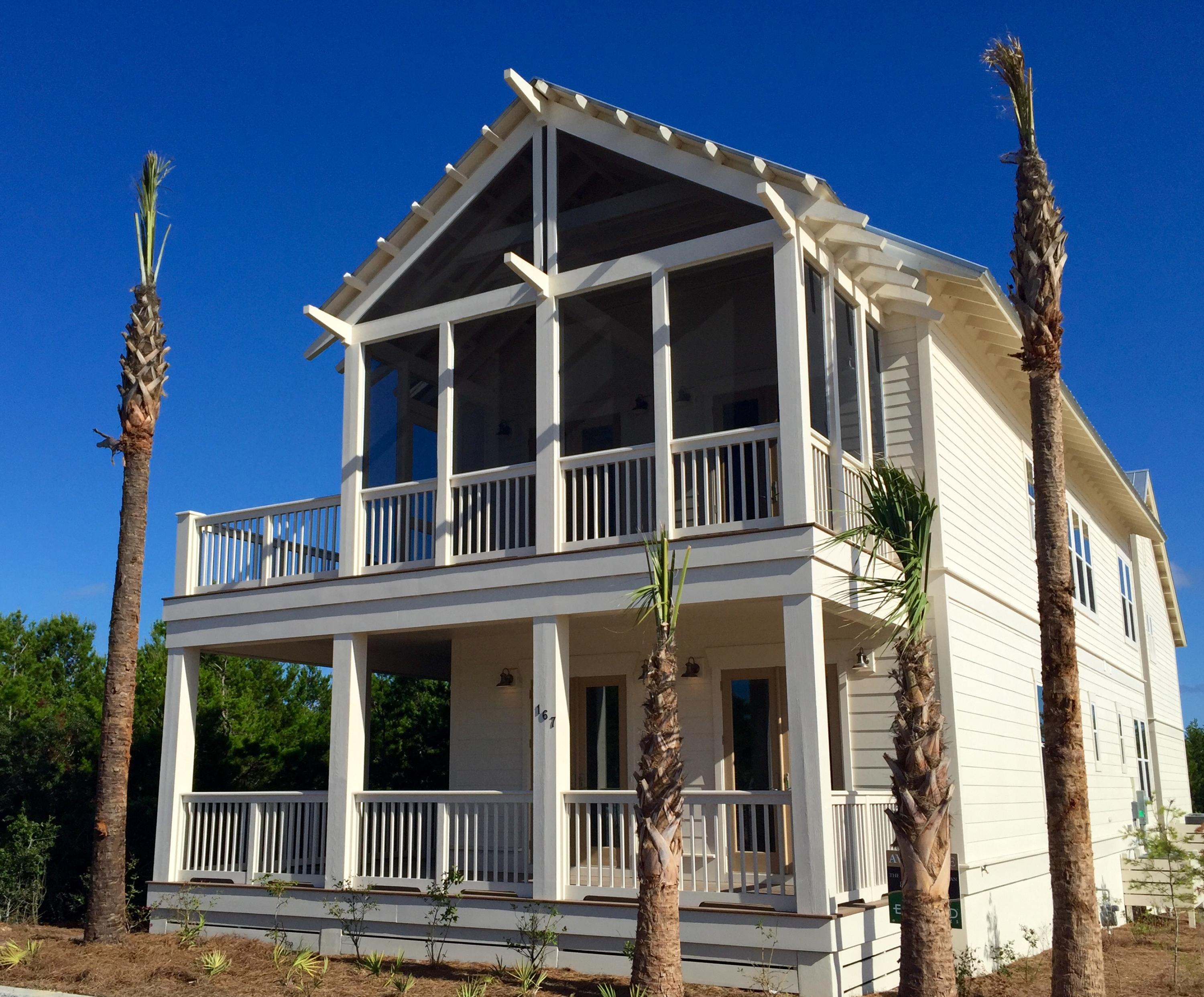 167 Clipper Street Inlet Beach, FL 32461 - Photo 1 of 43 front view of a building with a small yard