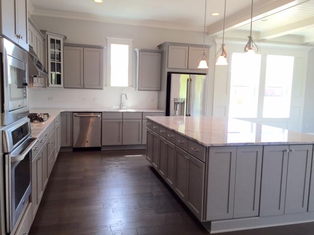 167 Clipper Street Inlet Beach, FL 32461 - Photo 12 of 43 a kitchen with stainless steel appliances granite countertop a sink a stove and a refrigerator