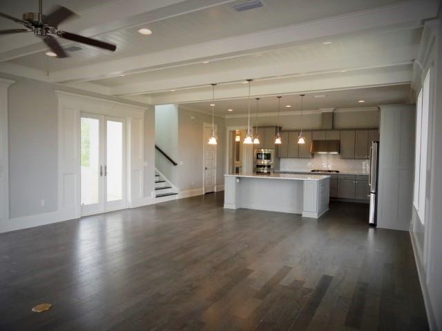 167 Clipper Street Inlet Beach, FL 32461 - Photo 14 of 43 a room with stainless steel appliances kitchen island wooden floors and view living room