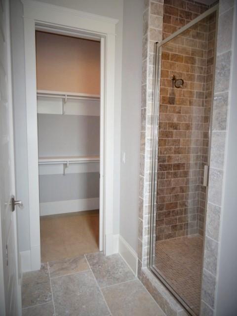 167 Clipper Street Inlet Beach, FL 32461 - Photo 22 of 43 a bathroom with a glass shower door