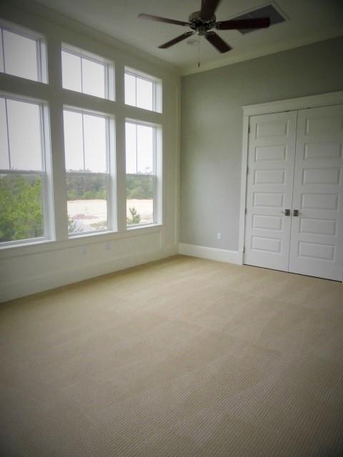 167 Clipper Street Inlet Beach, FL 32461 - Photo 25 of 43 an empty room with a empty space and windows