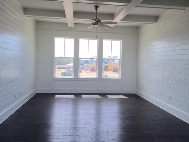 167 Clipper Street Inlet Beach, FL 32461 - Photo 26 of 43 an empty room with wooden floor and windows