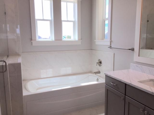 167 Clipper Street Inlet Beach, FL 32461 - Photo 29 of 43 a bathroom with a bathtub and a sink