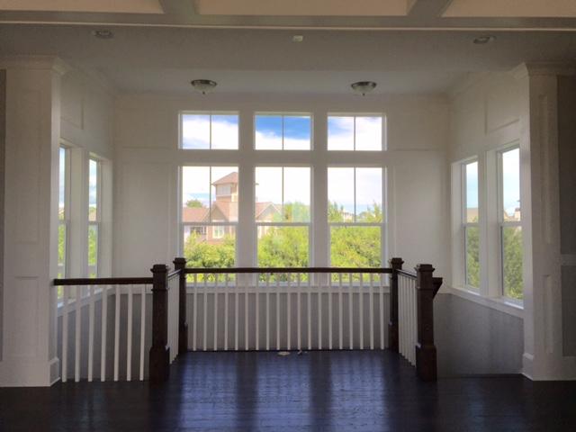167 Clipper Street Inlet Beach, FL 32461 - Photo 40 of 43 a view of an empty room with wooden floor and a window