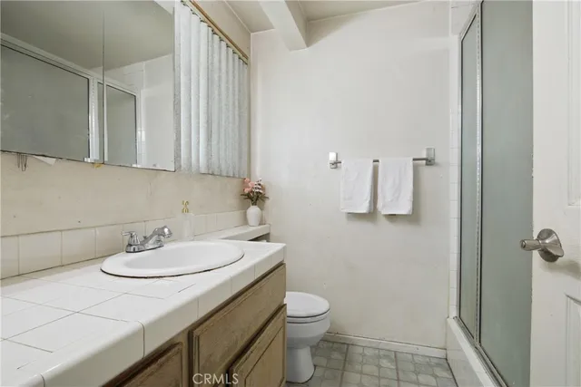 a bathroom with a sink and a toilet