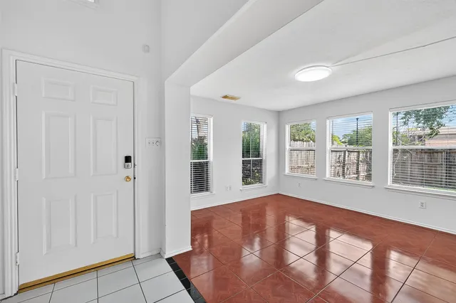 a living room with windows