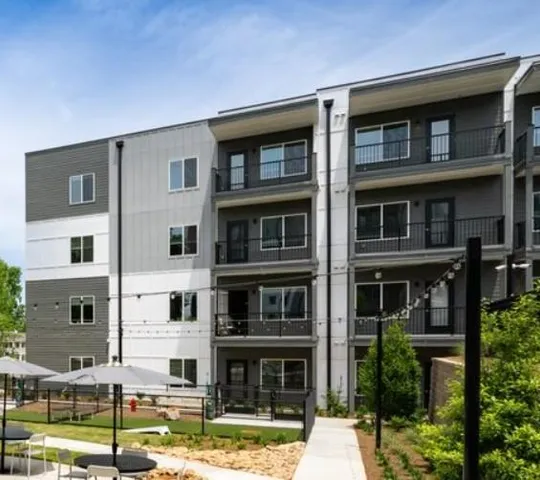 a view of a balcony with chairs