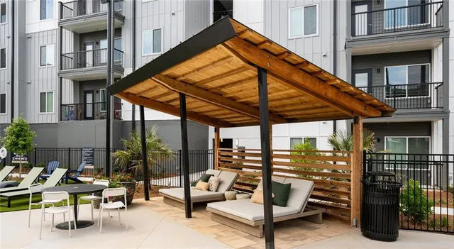 a view of an chairs and tables in the patio