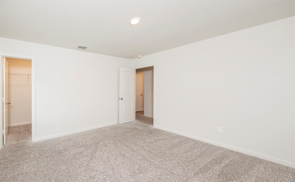 13608 Mineral Road Ponder, TX 76259 - Photo 28 of 36 Unfurnished room featuring light colored carpet and baseboards