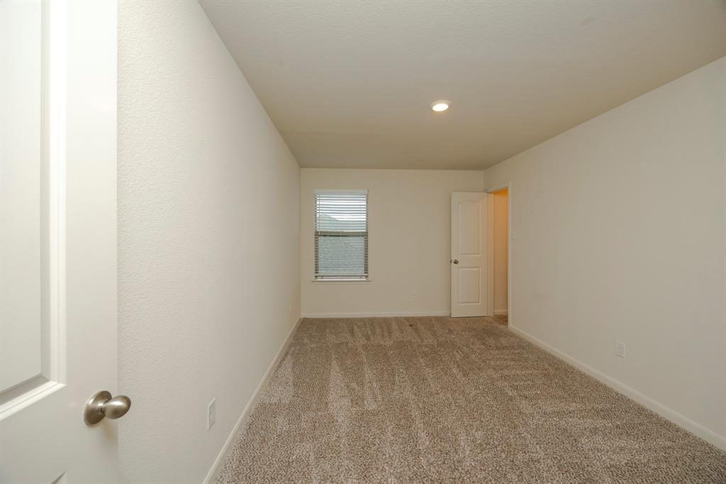 13608 Mineral Road Ponder, TX 76259 - Photo 29 of 36 Carpeted empty room with baseboards