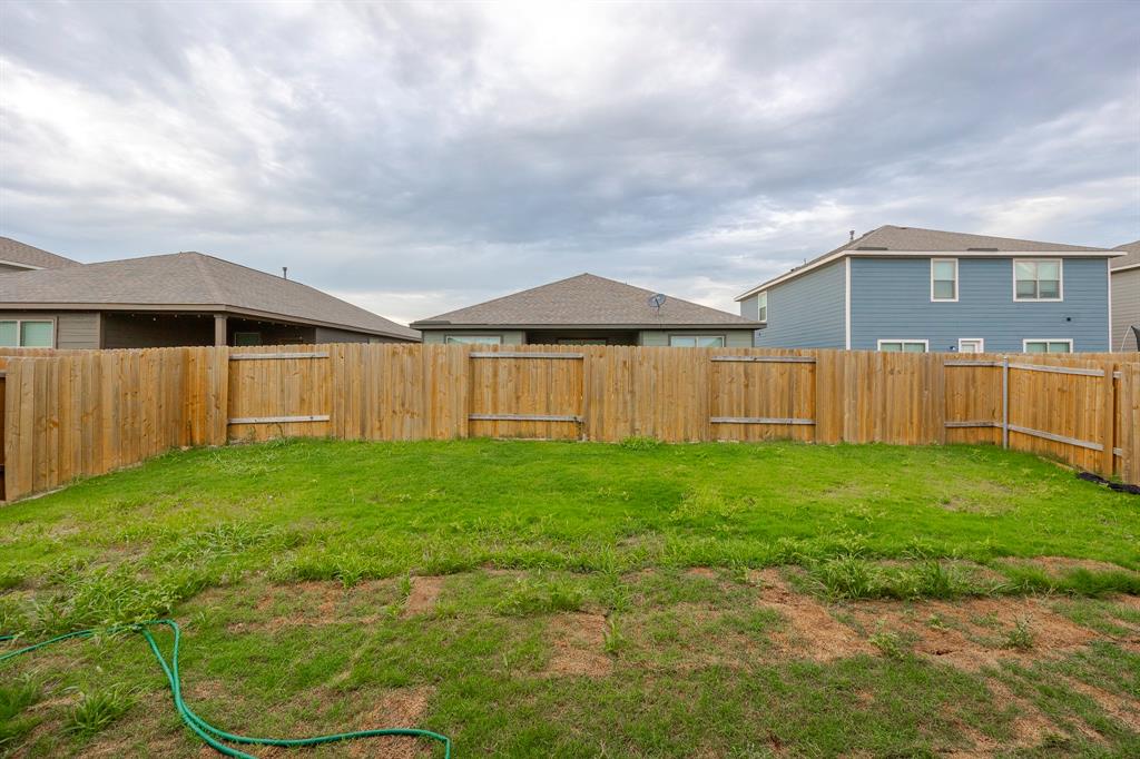 13608 Mineral Road Ponder, TX 76259 - Photo 33 of 36 View of fenced backyard