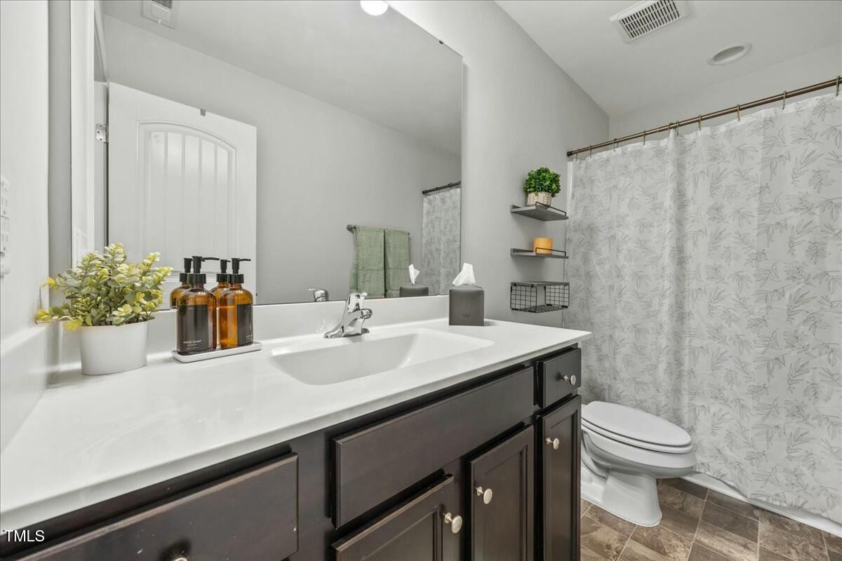 5306 Beckom Street Raleigh, NC 27616 - Photo 5 of 38 First Floor Bathroom