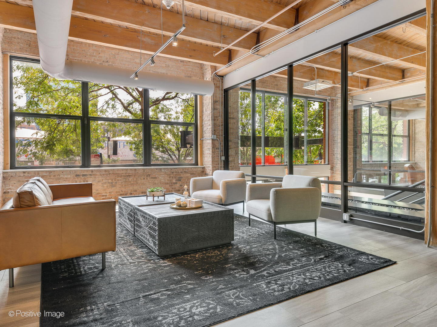 1040 West Adams Street, Unit 350 Chicago, IL 60607 - Photo 18 of 22 a living room with furniture and a large window