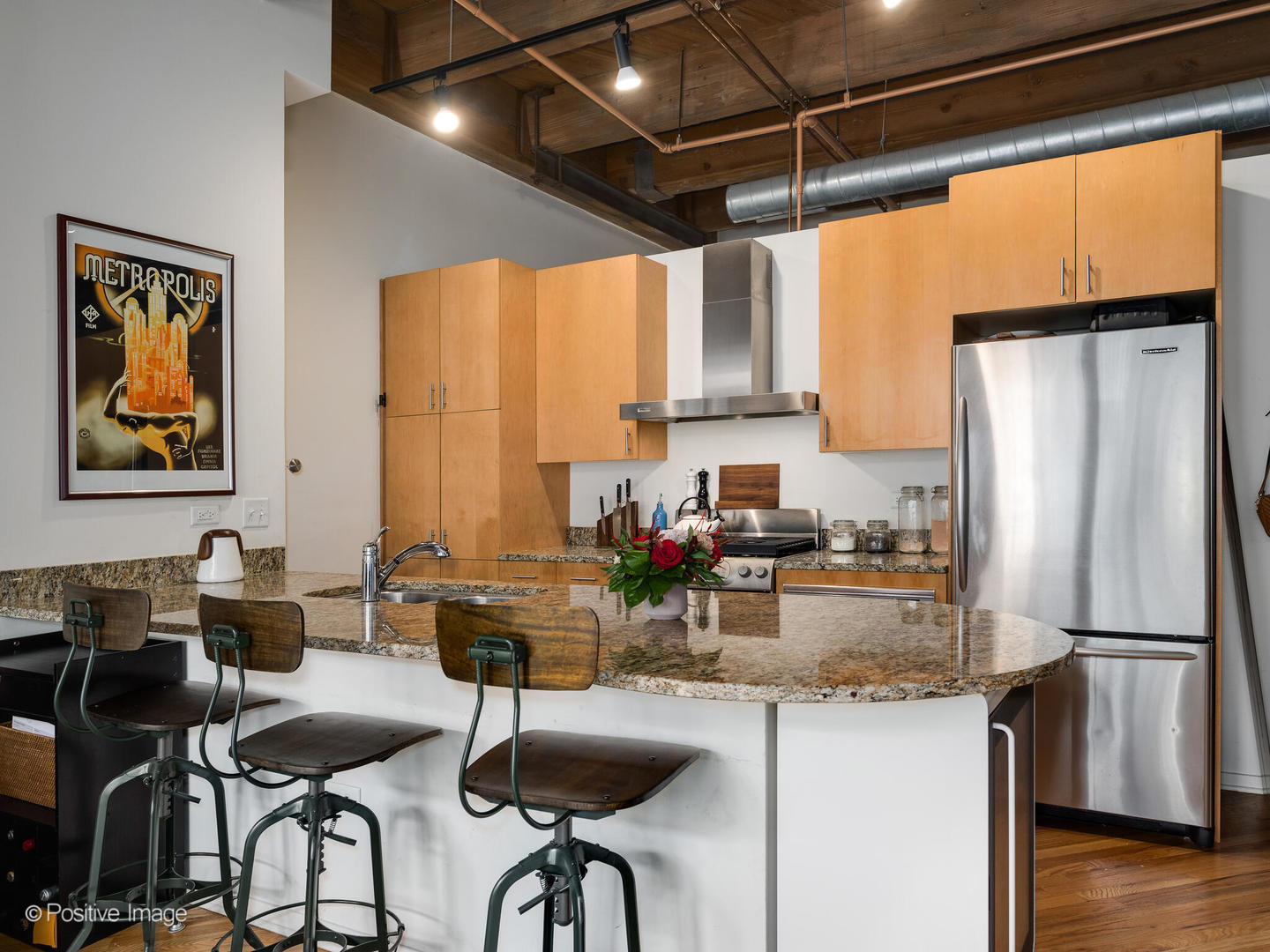 1040 West Adams Street, Unit 350 Chicago, IL 60607 - Photo 7 of 22 a kitchen with sink refrigerator and window