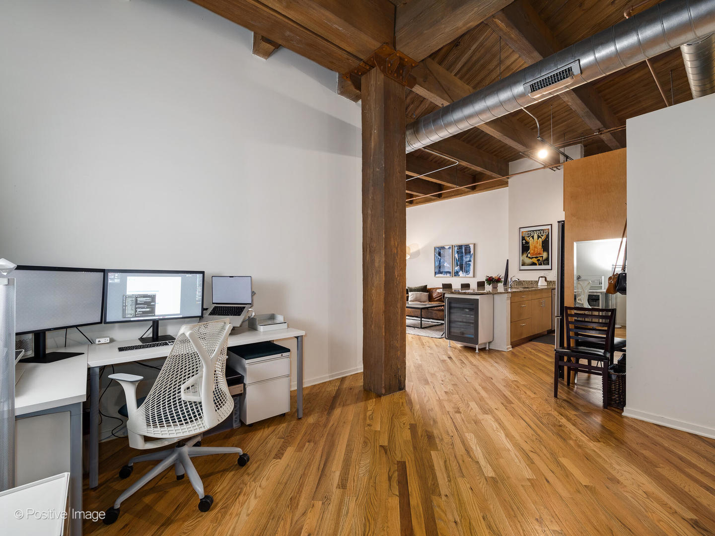 1040 West Adams Street, Unit 350 Chicago, IL 60607 - Photo 9 of 22 a kitchen with granite countertop a sink stainless steel appliances and counter space