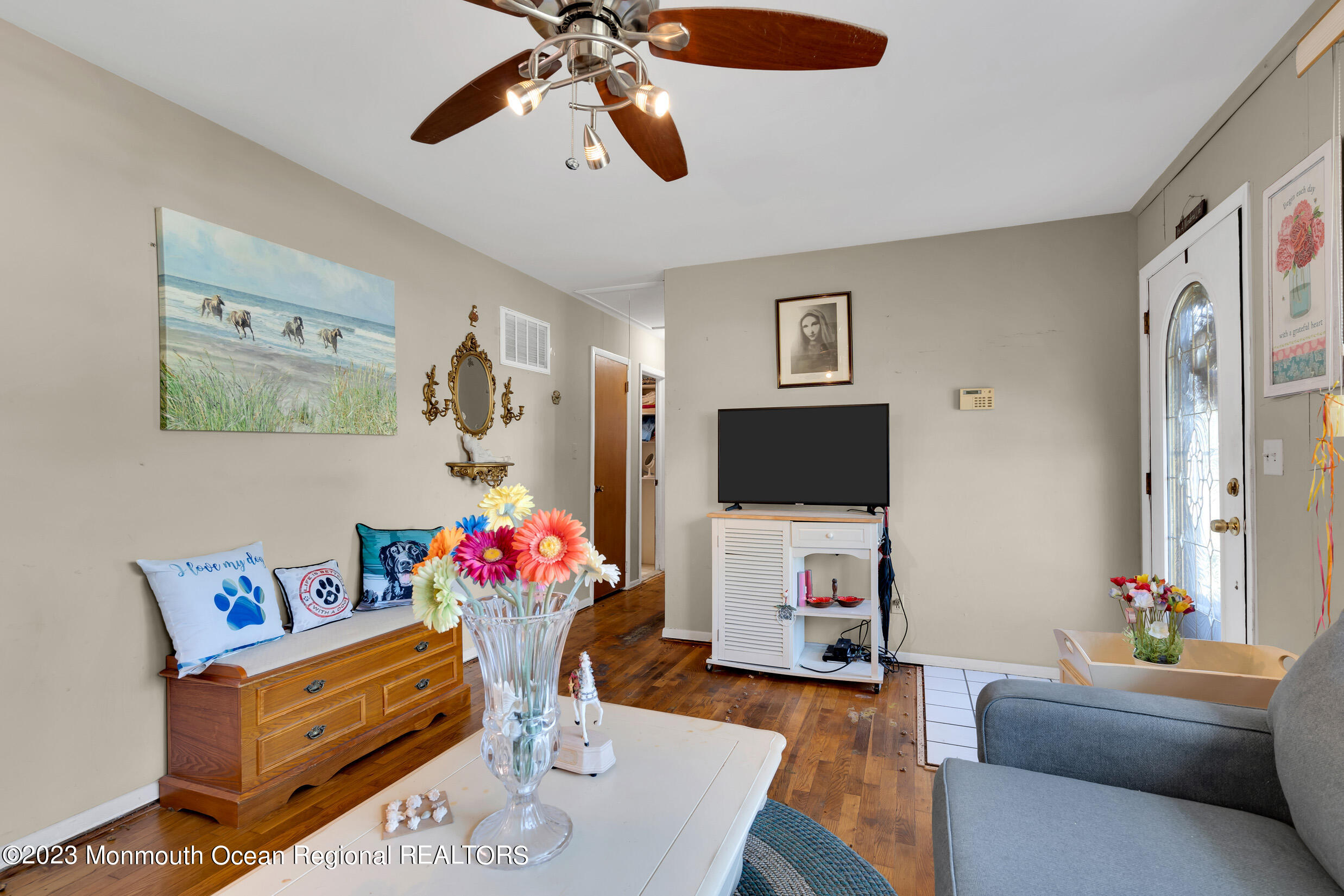 325 Stearman Road Brick, NJ 08723 - Photo 18 of 35 a living room with furniture and a flat screen tv