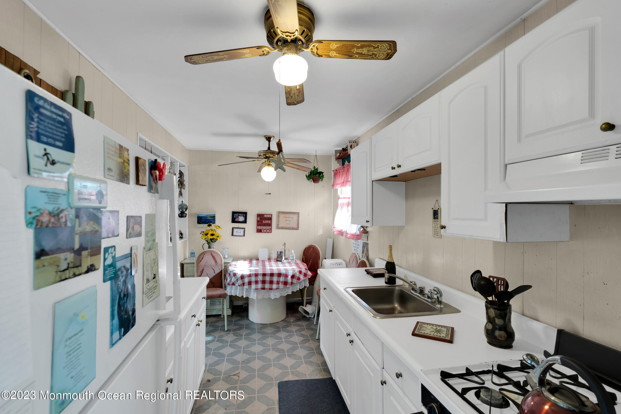 325 Stearman Road Brick, NJ 08723 - Photo 22 of 35 a kitchen that has a lot of cabinets a sink and appliances in it