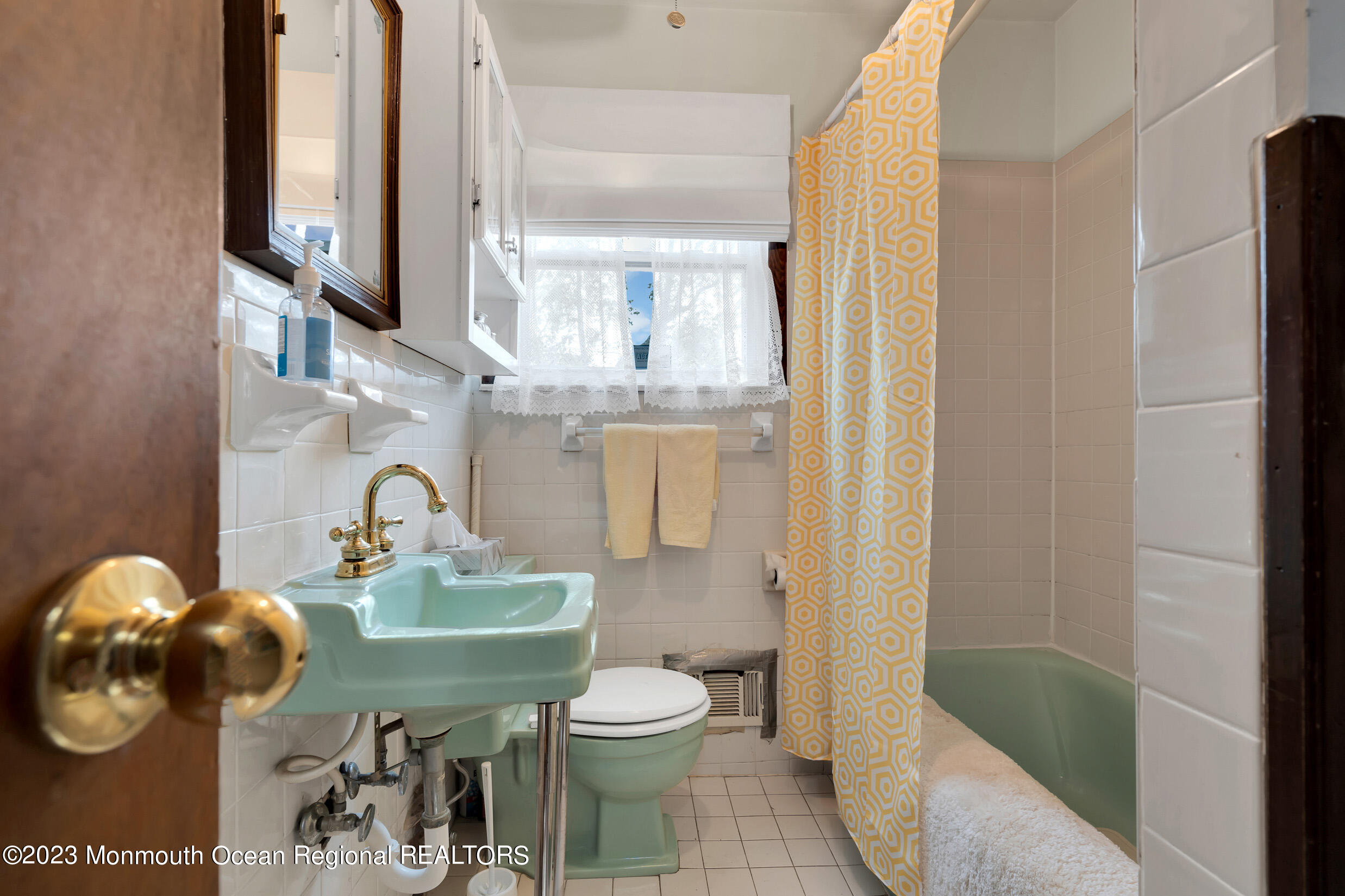 325 Stearman Road Brick, NJ 08723 - Photo 24 of 35 a bathroom with a toilet a sink and mirror