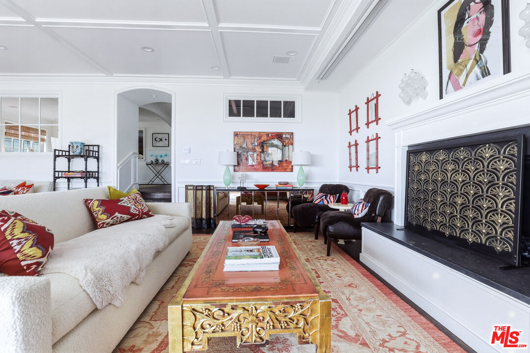 30810 Broad Beach Road Malibu, CA 90265 - Photo 27 of 55 a living room with furniture or couch and a painting on the wall