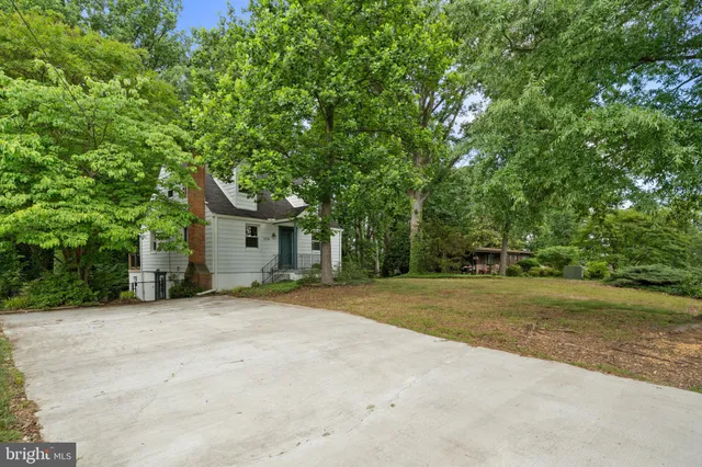 a house with trees in front of it
