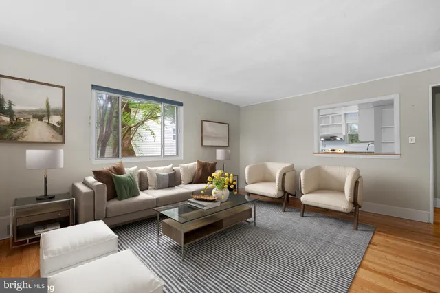 a living room with furniture and a couch