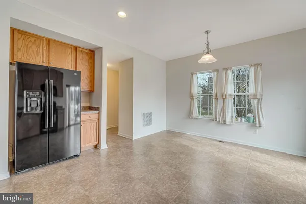 a view of livingroom with kitchen