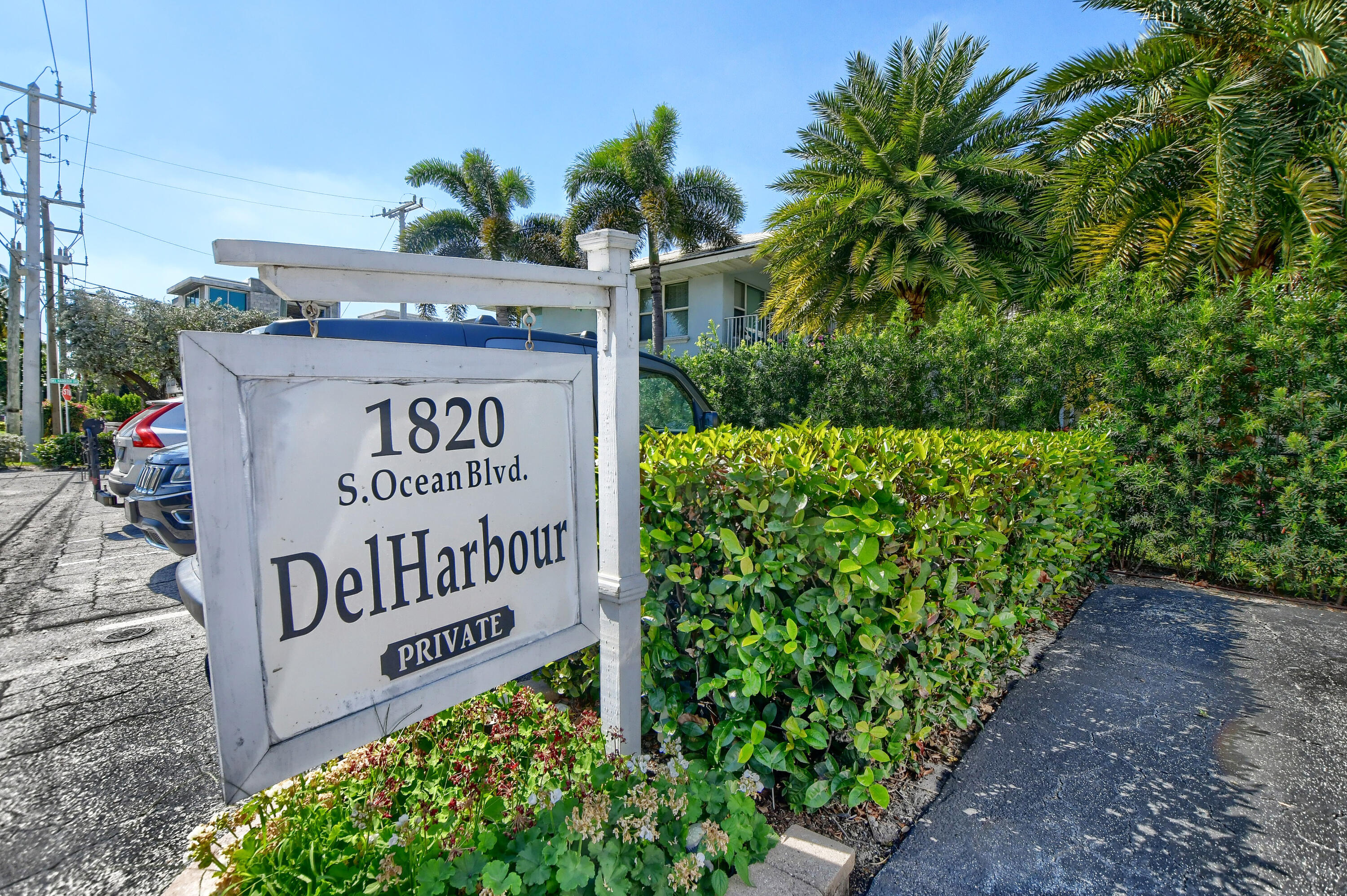 1820 South Ocean Boulevard, Unit 1E Delray Beach, FL 33483 - Photo 1 of 34 a sign on the side of the road