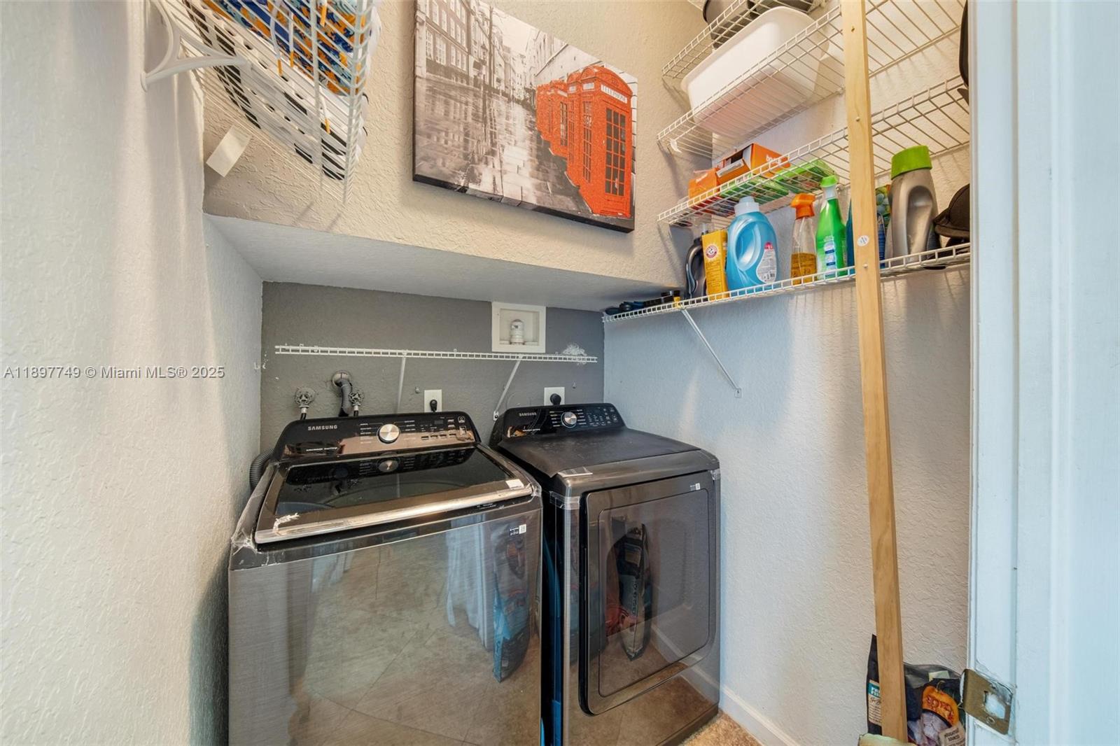 3869 Northwest 92nd Avenue Sunrise, FL 33351 - Photo 30 of 40 a utility room with dryer and washer