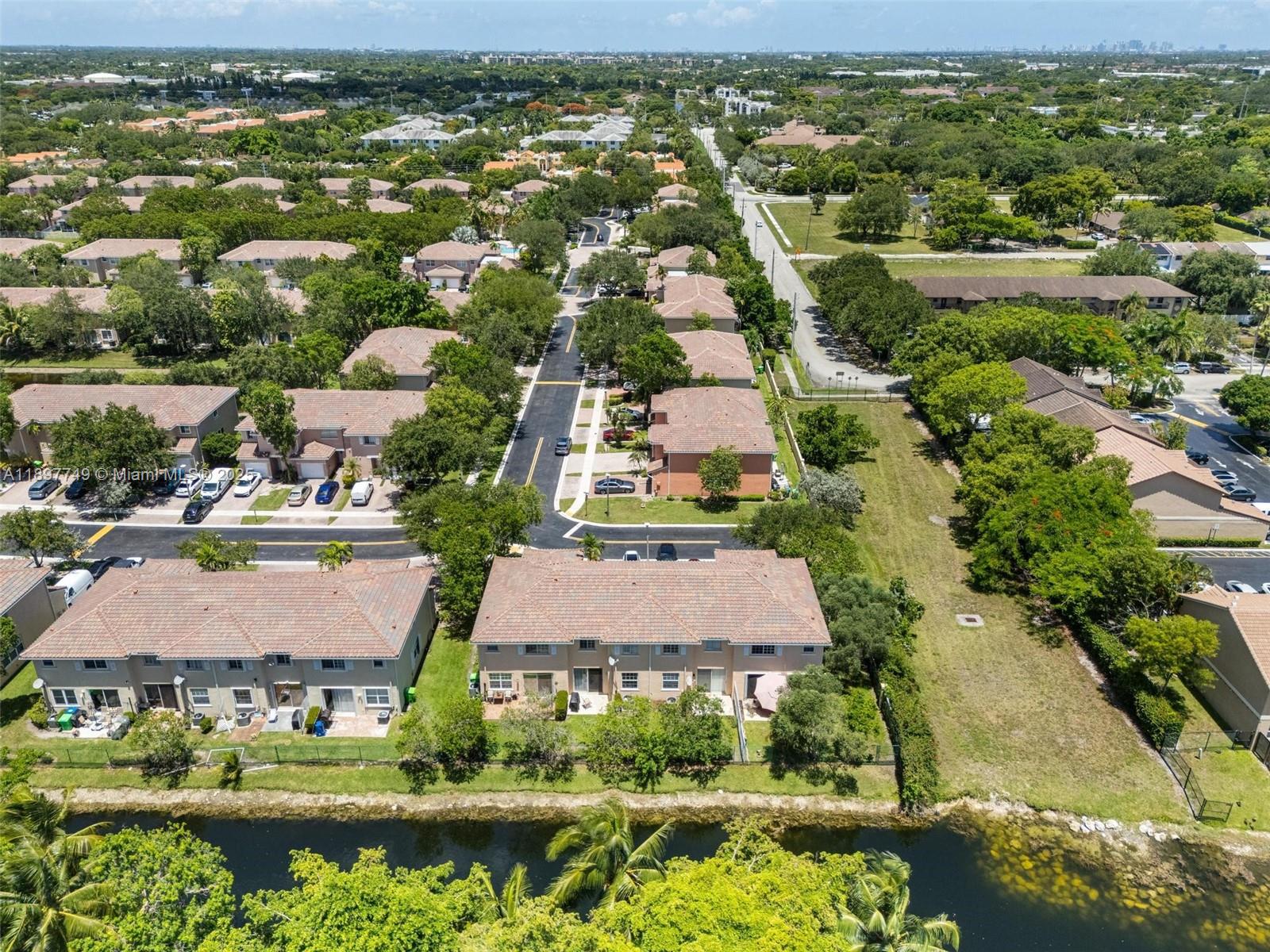 3869 Northwest 92nd Avenue Sunrise, FL 33351 - Photo 38 of 40 an aerial view of residential houses with outdoor space and river view