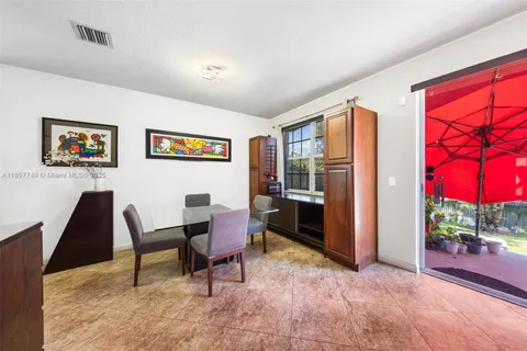 a view of a livingroom with furniture and a gate