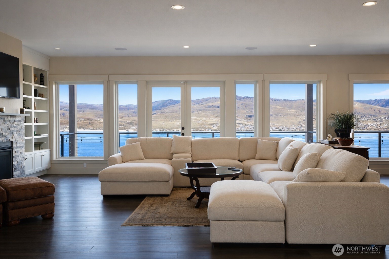 149 Clos Chevalle Road Chelan, WA 98816 - Photo 6 of 37 a living room with furniture and a large window