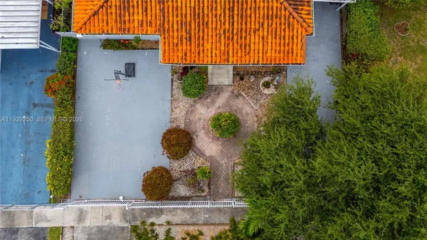 a bird view of house and yard