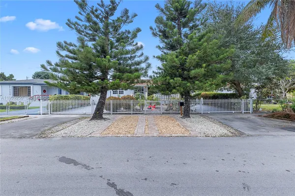 a front view of a house with a patio