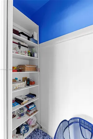 a room with furniture and a window