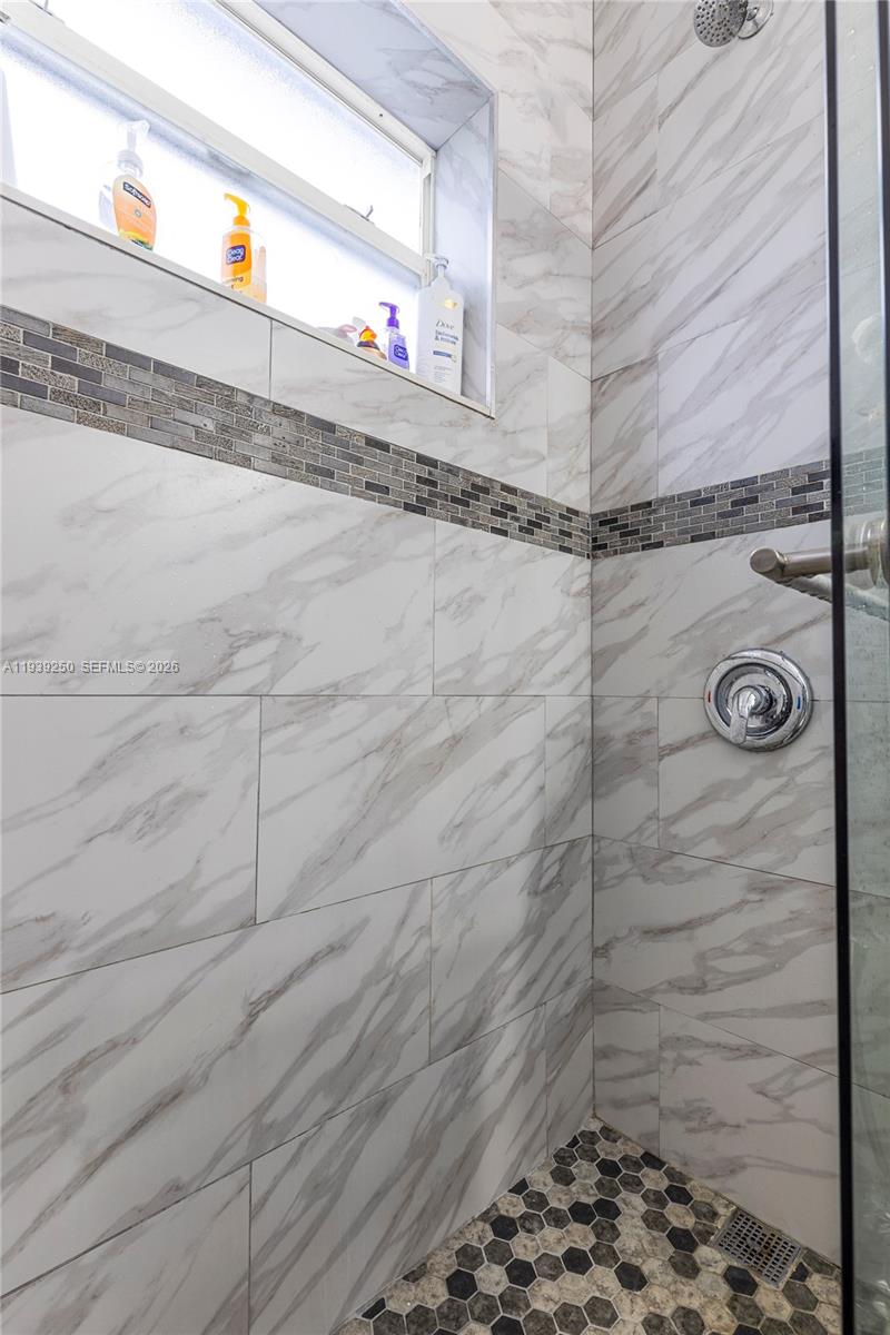 116 East 59th Street Hialeah, FL 33013 - Photo 33 of 51 a bathroom with a shower