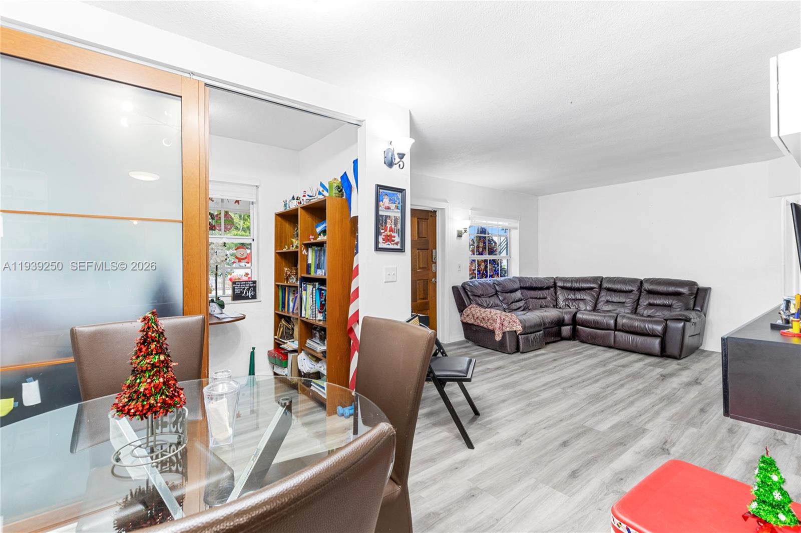 116 East 59th Street Hialeah, FL 33013 - Photo 51 of 51 a living room with furniture and wooden floor