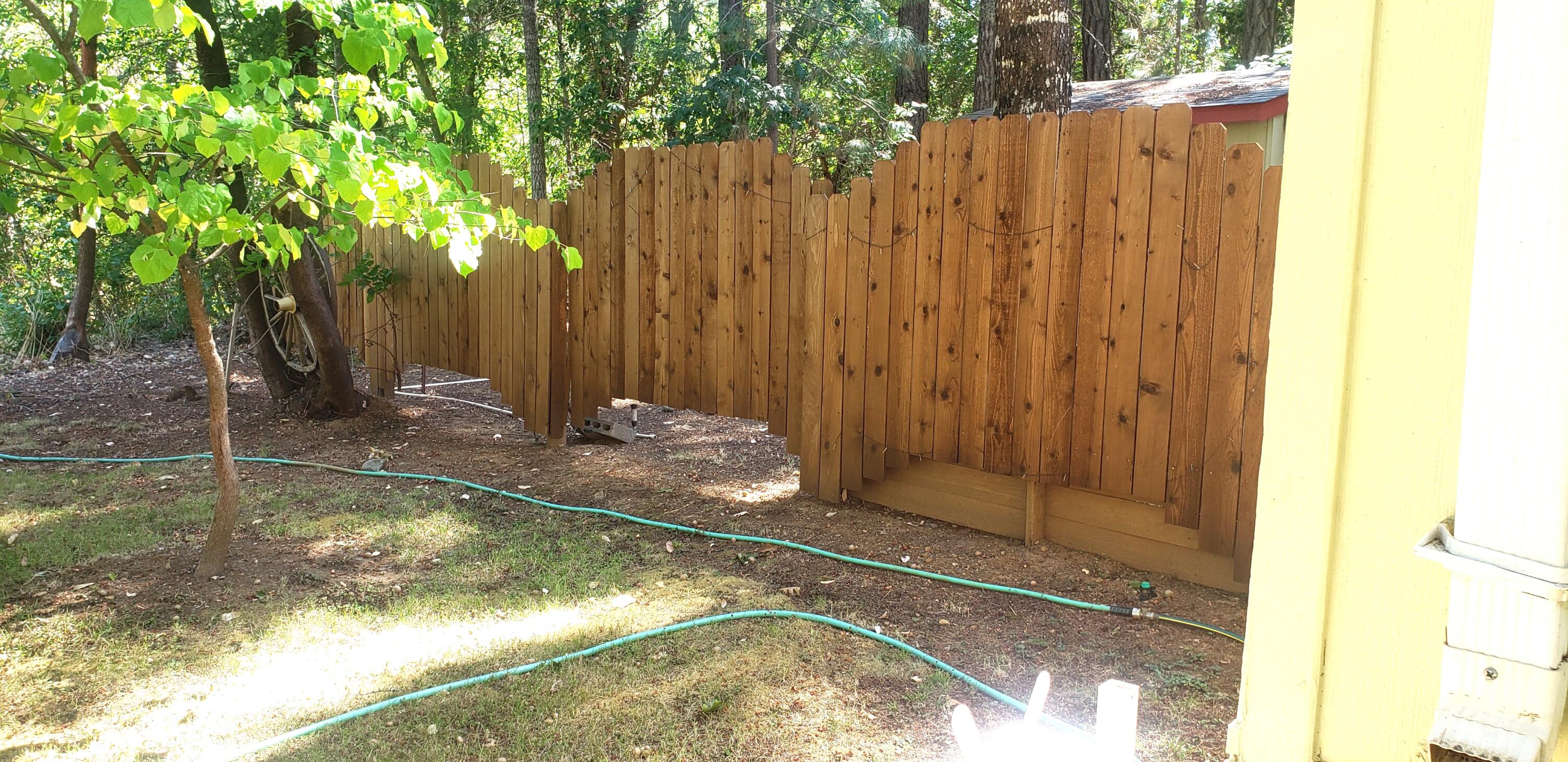 393 North Old Stage Road Cave Junction, OR 97523 - Photo 18 of 21 Decorative fencing & gate to back yard.