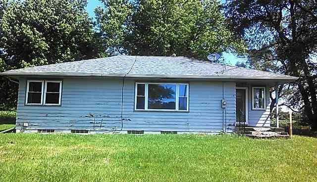 4170 Rotary Road Rockford, IL 61109 - Photo 1 of 13 a front view of a house with a garden