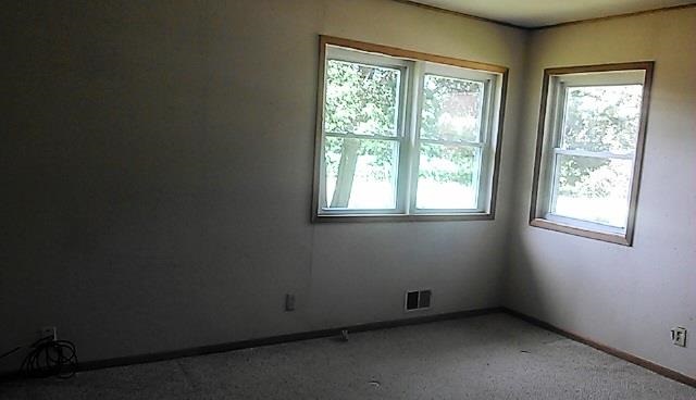 4170 Rotary Road Rockford, IL 61109 - Photo 10 of 13 an empty room with a window