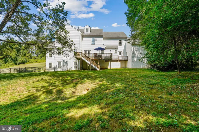 a view of a house with a big yard