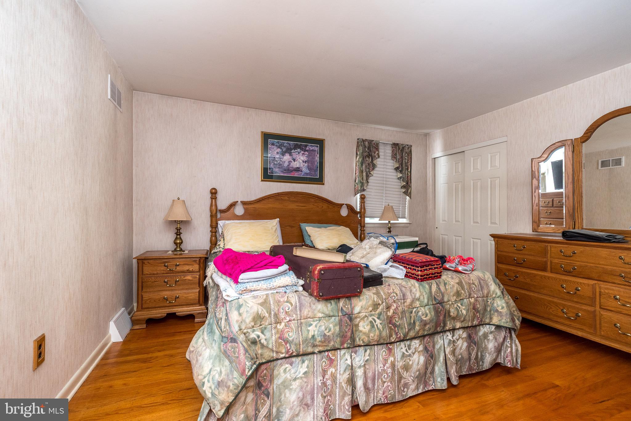 364 Abrams Mill Road King of Prussia, PA 19406 - Photo 22 of 43 a bedroom with bed and a couch