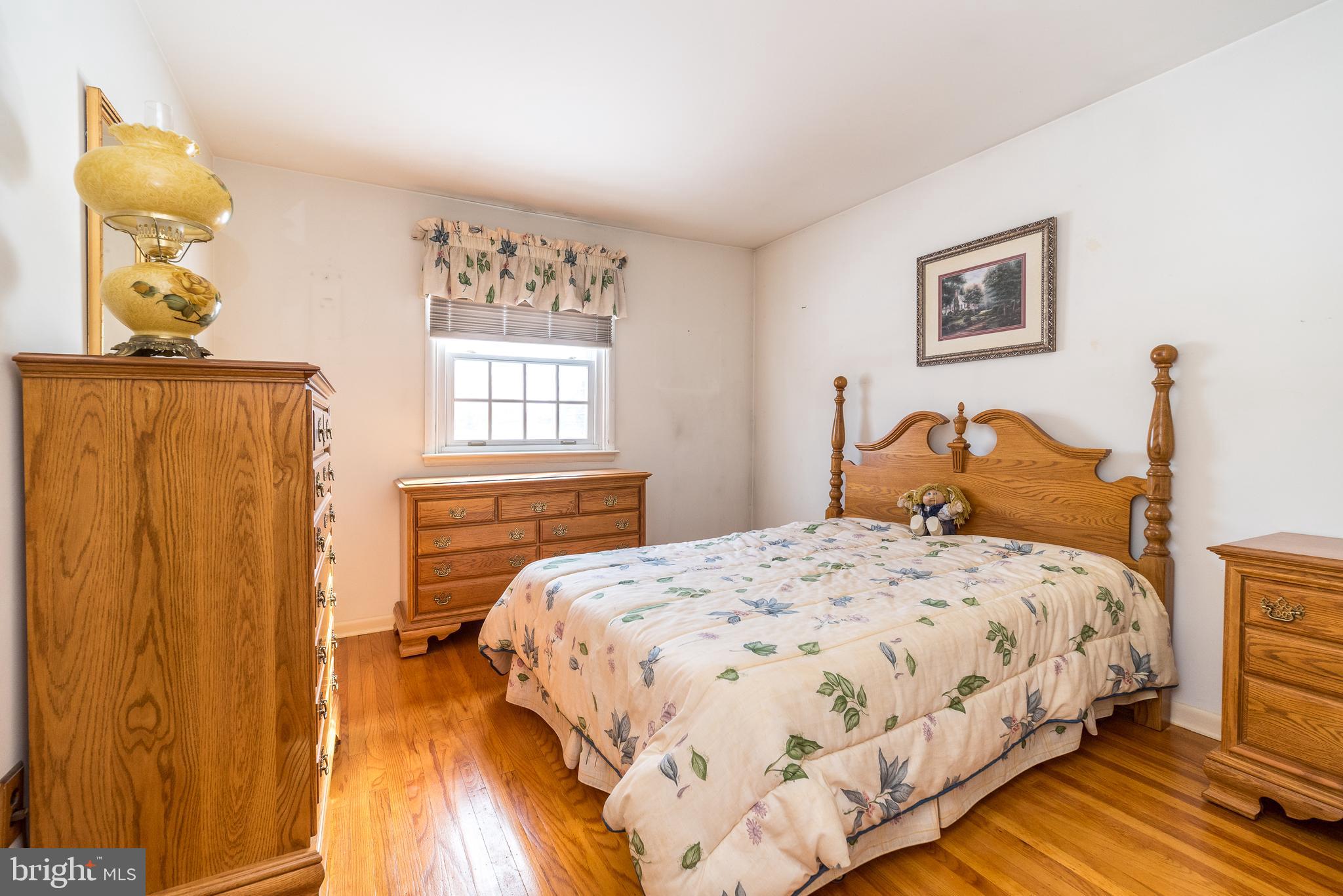 364 Abrams Mill Road King of Prussia, PA 19406 - Photo 24 of 43 a bedroom with a bed and wooden floor