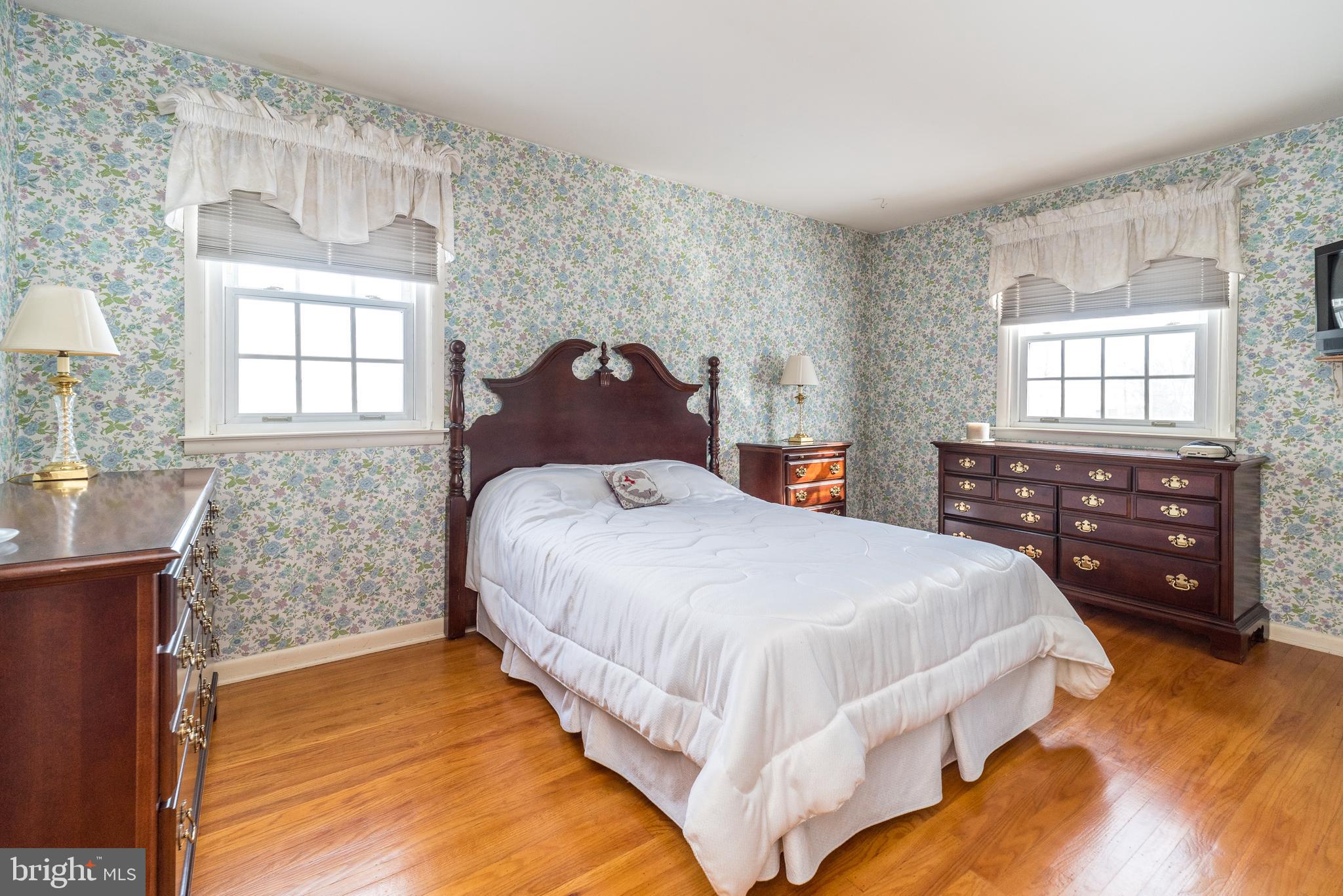 364 Abrams Mill Road King of Prussia, PA 19406 - Photo 25 of 43 a bedroom with a bed and a dresser