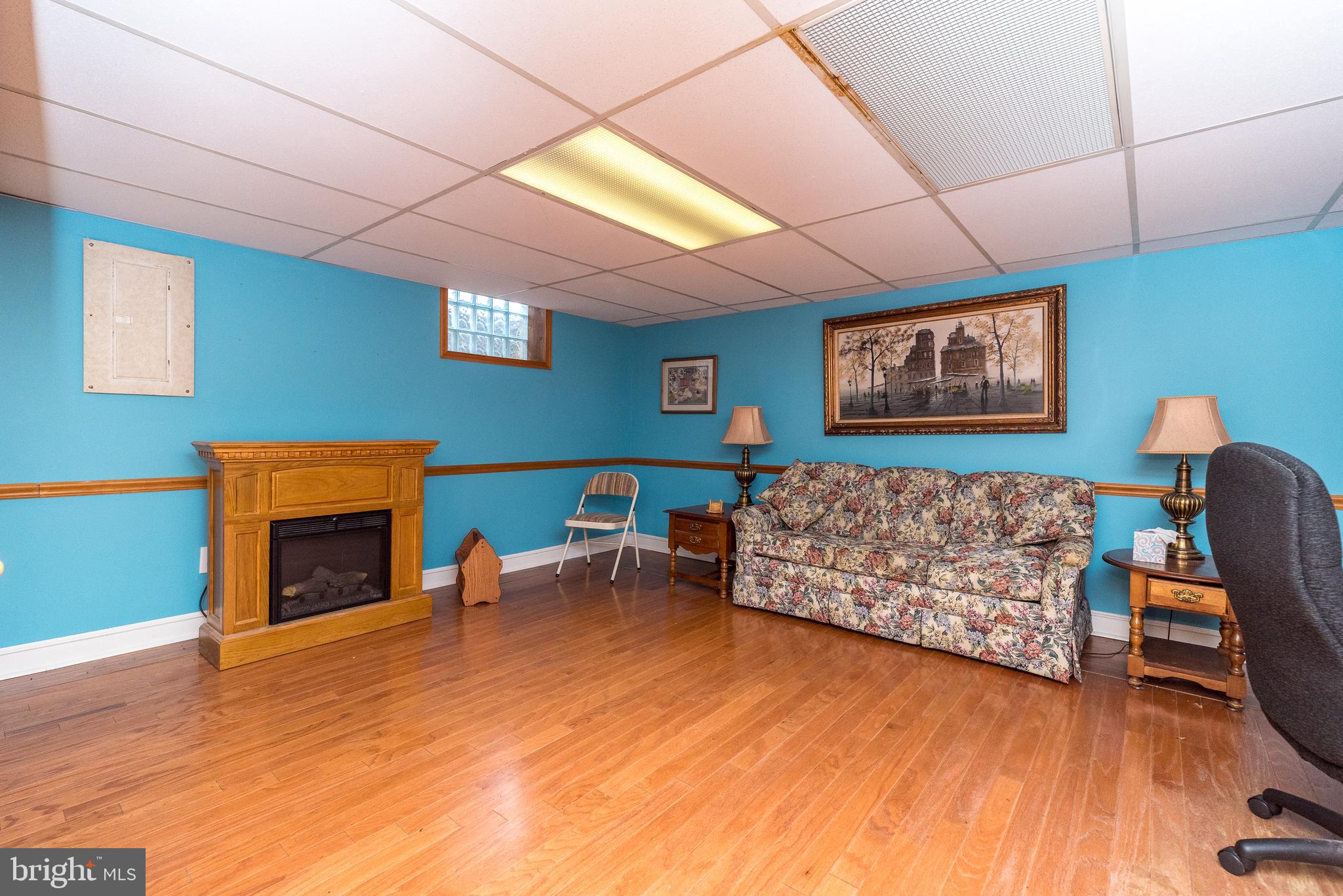 364 Abrams Mill Road King of Prussia, PA 19406 - Photo 35 of 43 a bed room with furniture and a fireplace