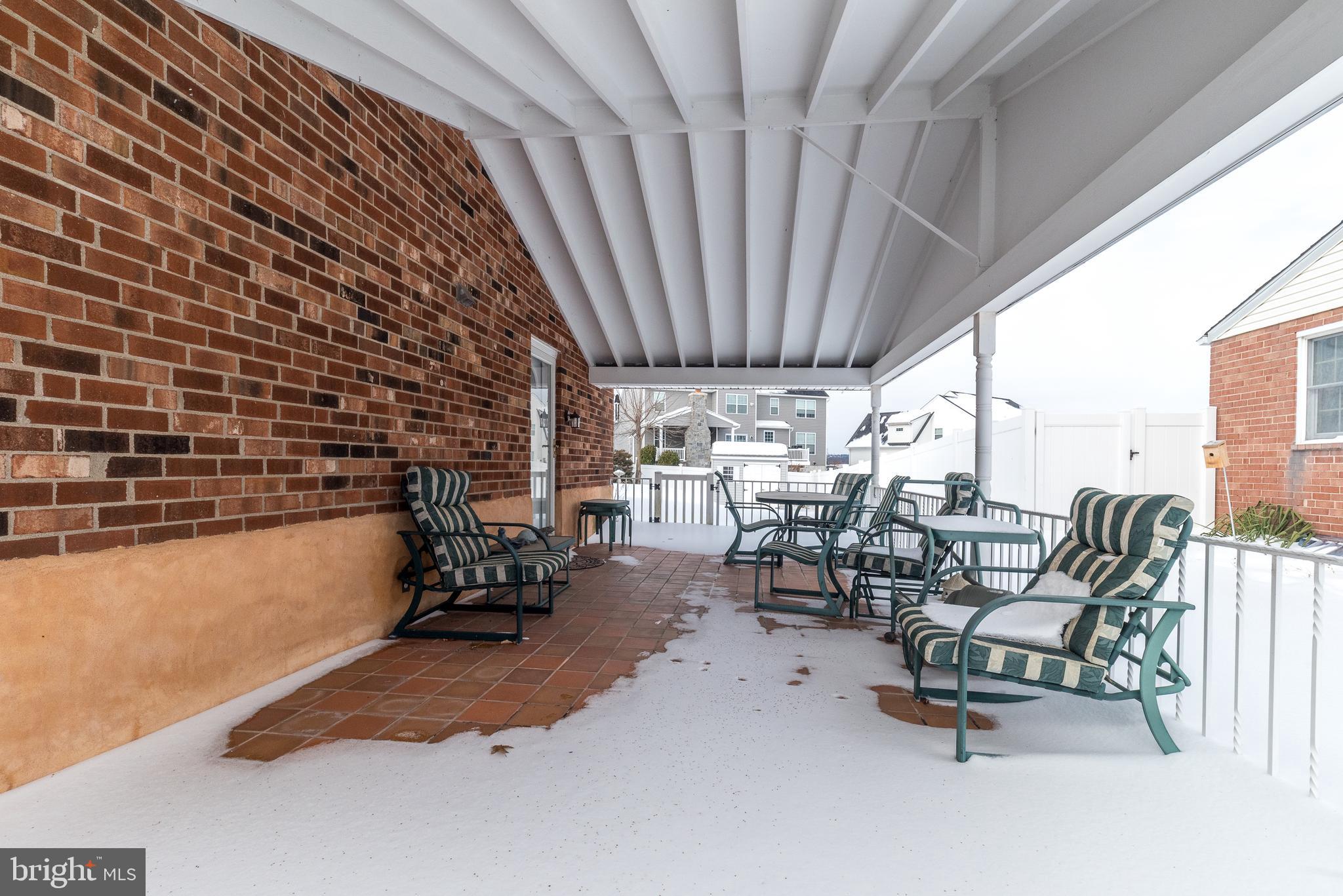 364 Abrams Mill Road King of Prussia, PA 19406 - Photo 7 of 43 a building outdoor space with patio furniture and potted plants