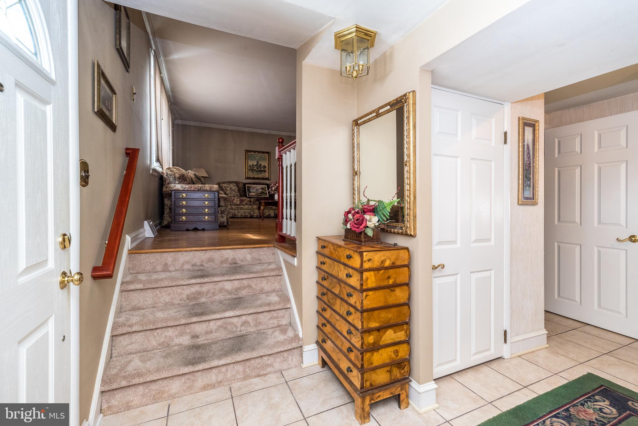 364 Abrams Mill Road King of Prussia, PA 19406 - Photo 9 of 43 a view of front door with hallway and stairs