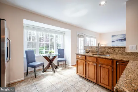 a view of a building with sitting area